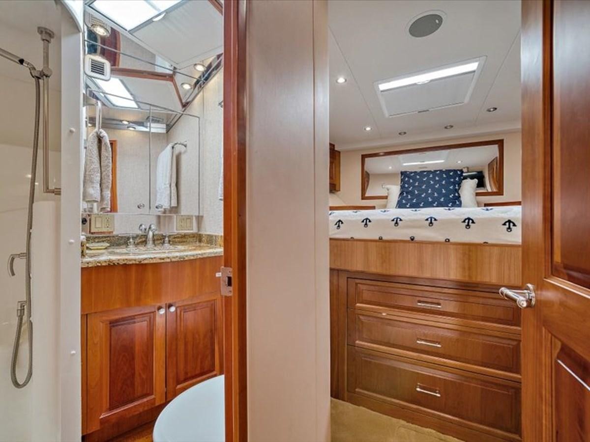 a bathroom with a sink and cabinets aboard EVA VII Yacht for Sale