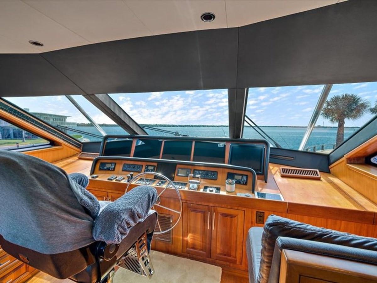 a boat with a large window aboard EVA VII Yacht for Sale