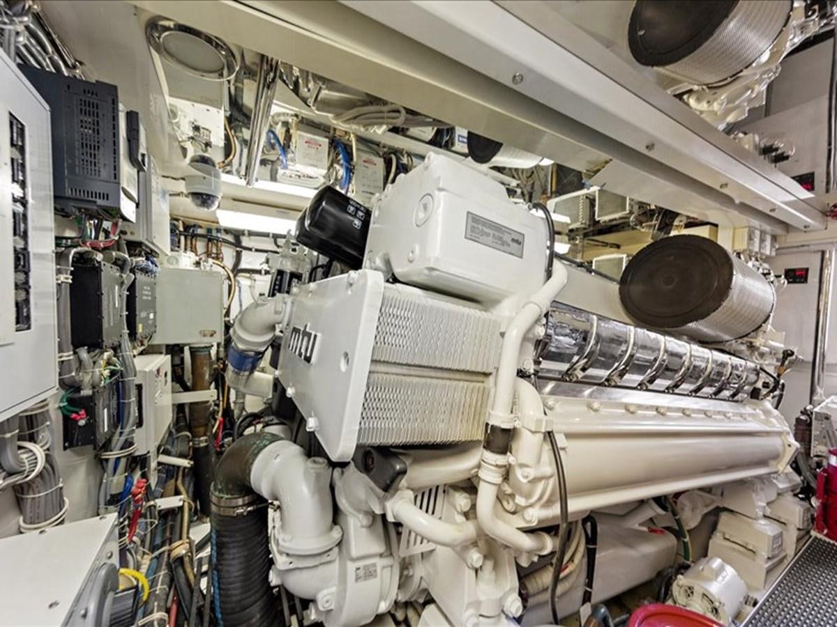 a white machine in a room aboard EVA VII Yacht for Sale