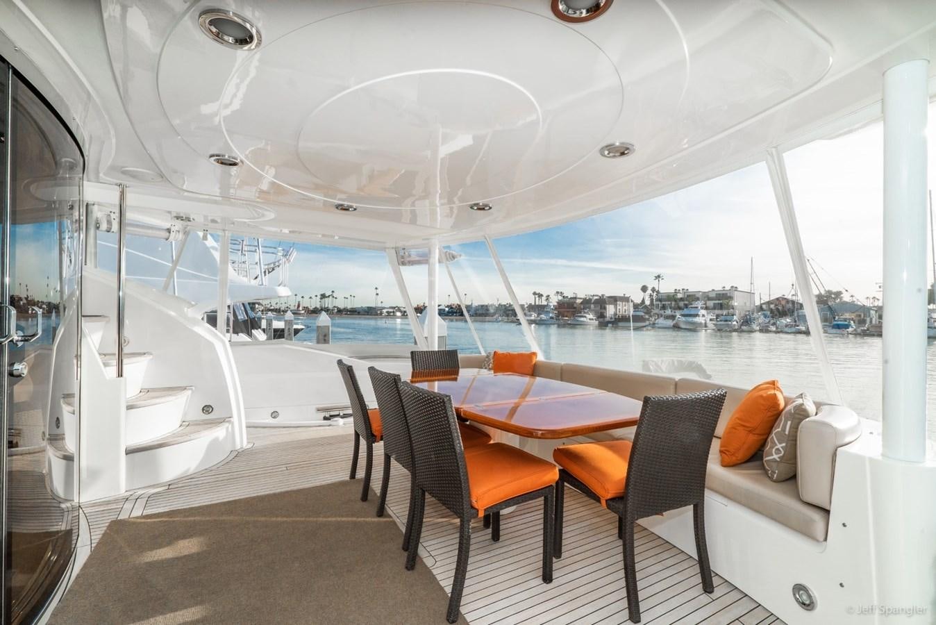 a room with a table and chairs aboard NAKOA Yacht for Sale