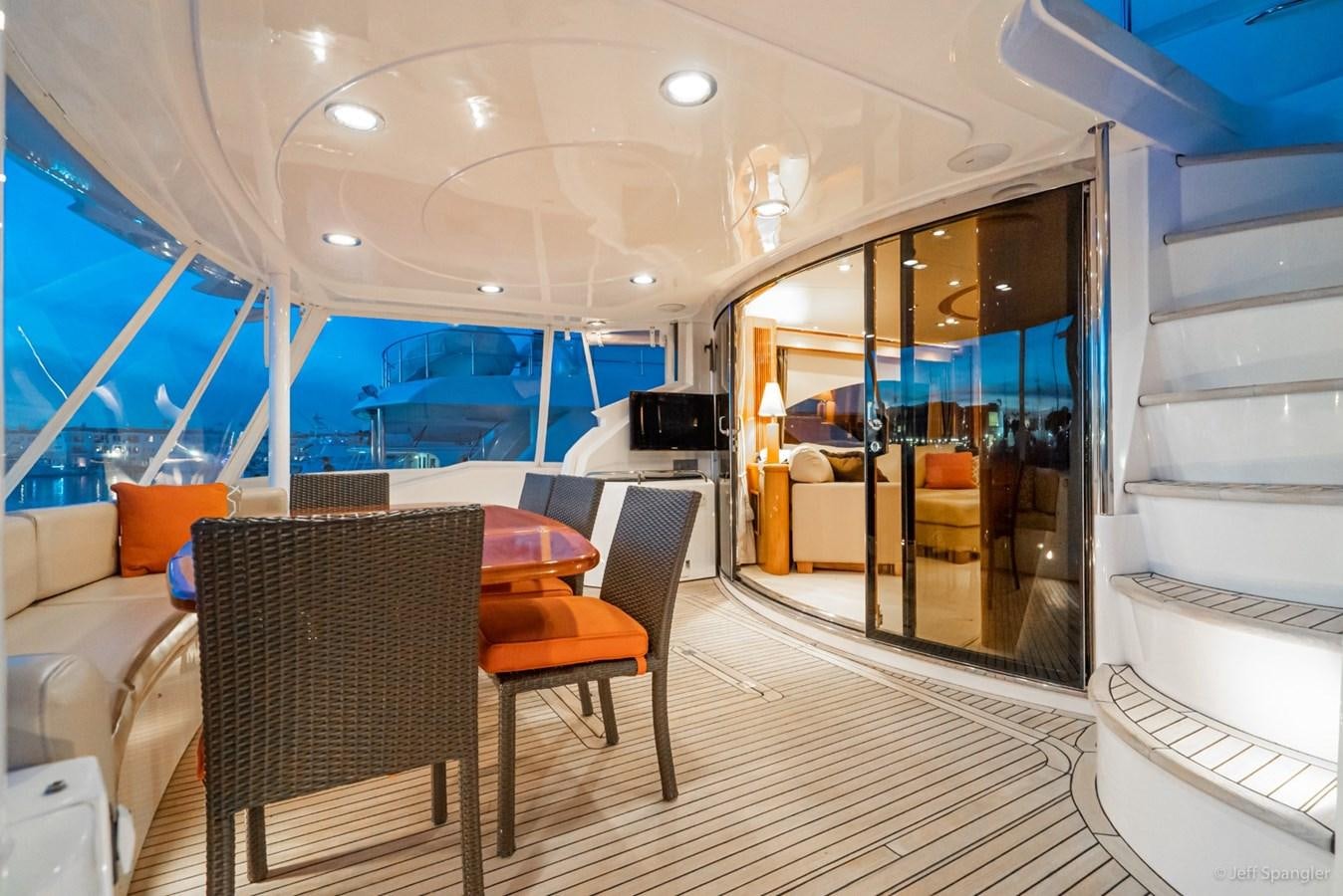 a room with a table and chairs aboard NAKOA Yacht for Sale