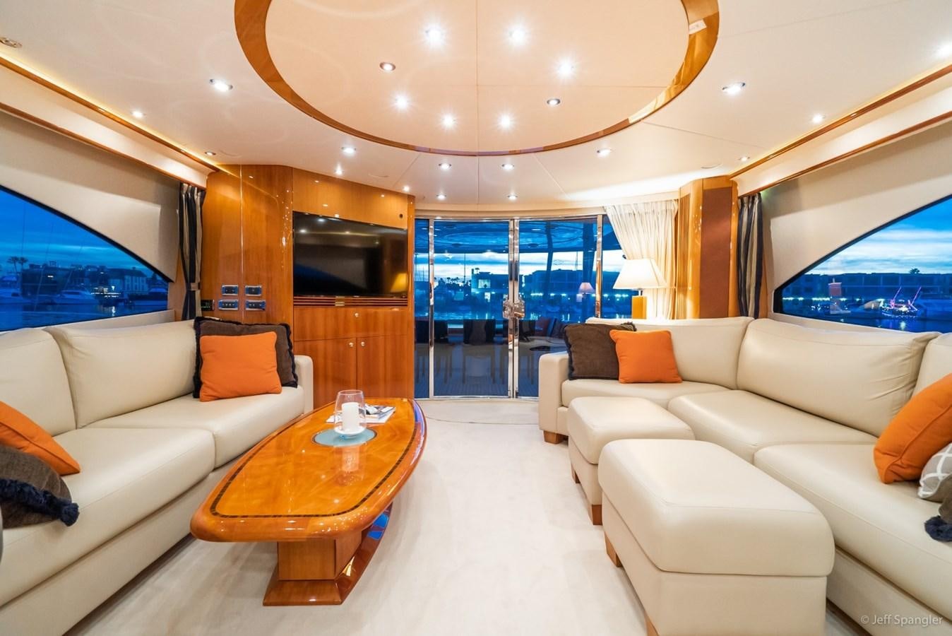 a living room with a large window aboard NAKOA Yacht for Sale