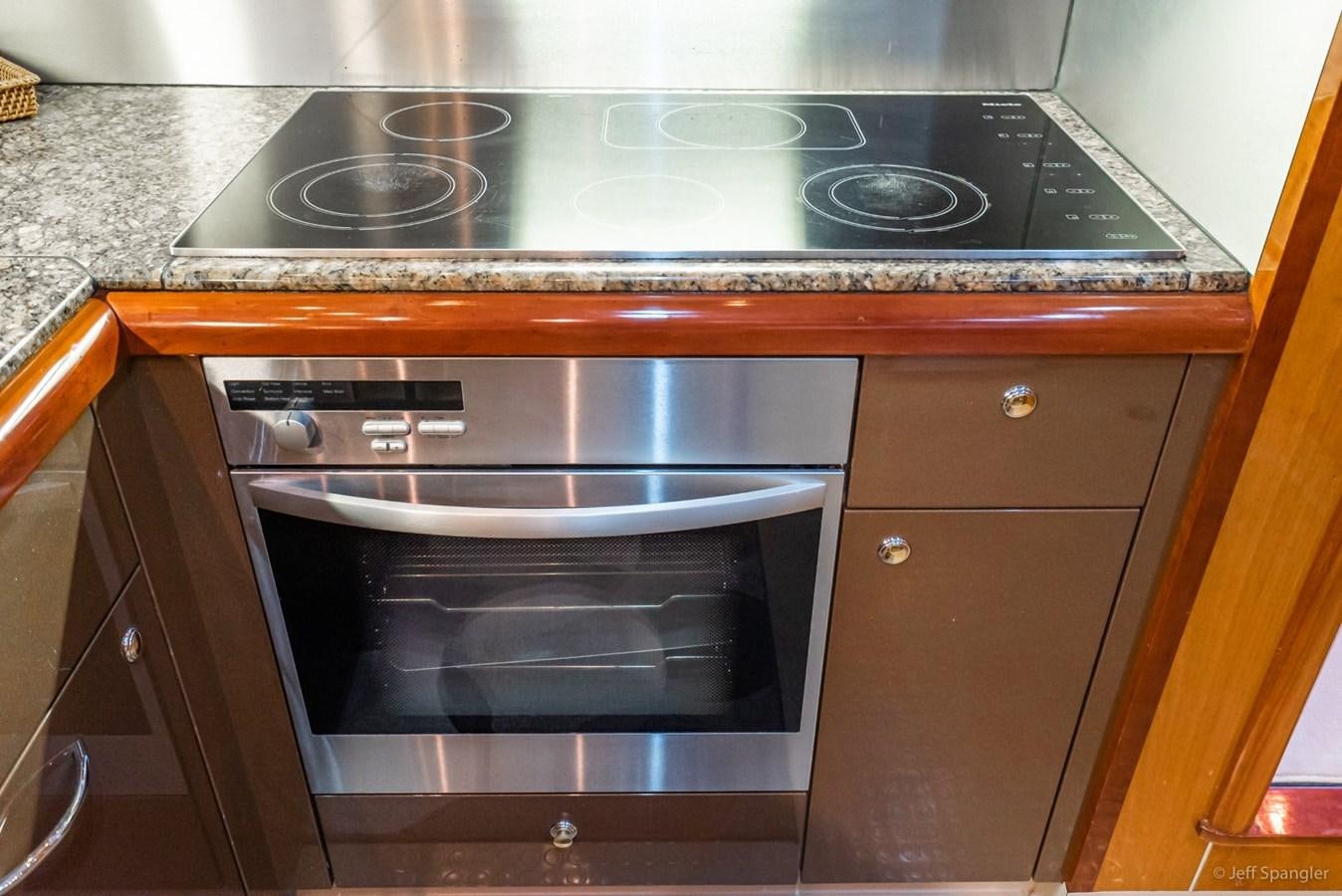 a stove with a vent aboard NAKOA Yacht for Sale