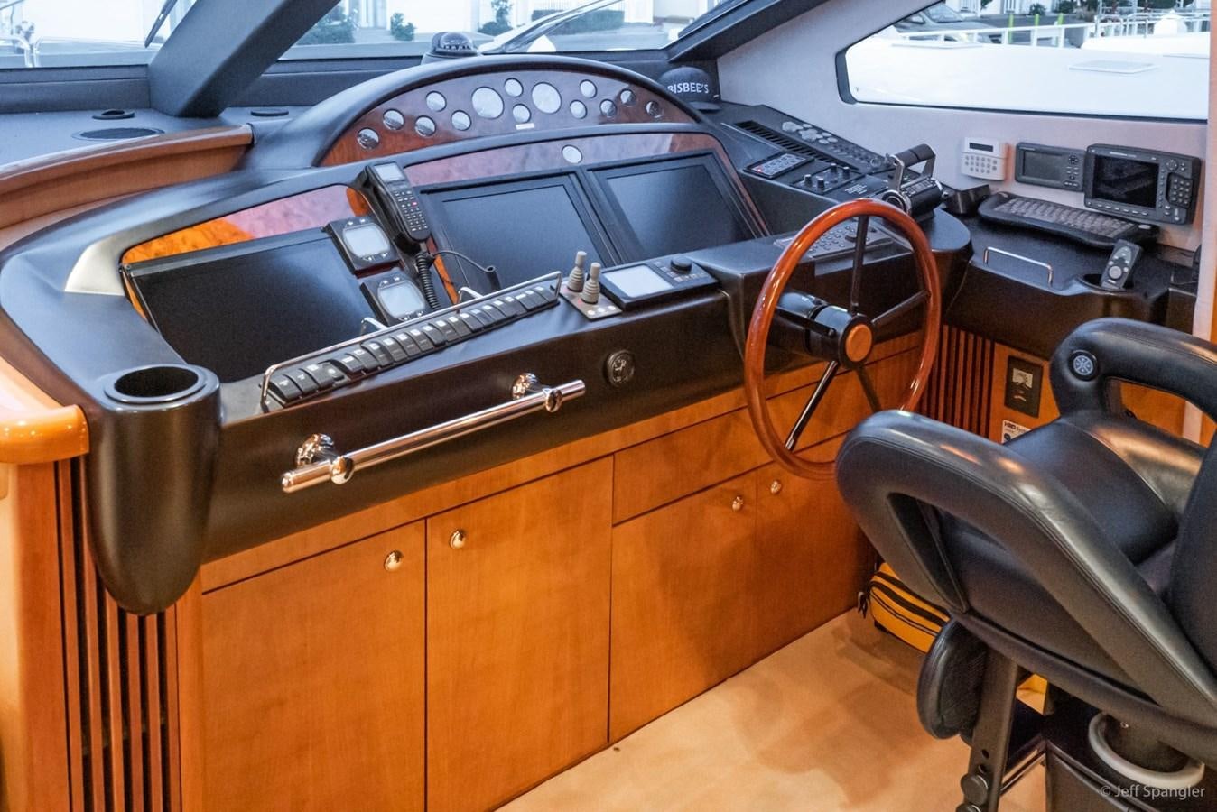 a wooden box with a gun on it aboard NAKOA Yacht for Sale