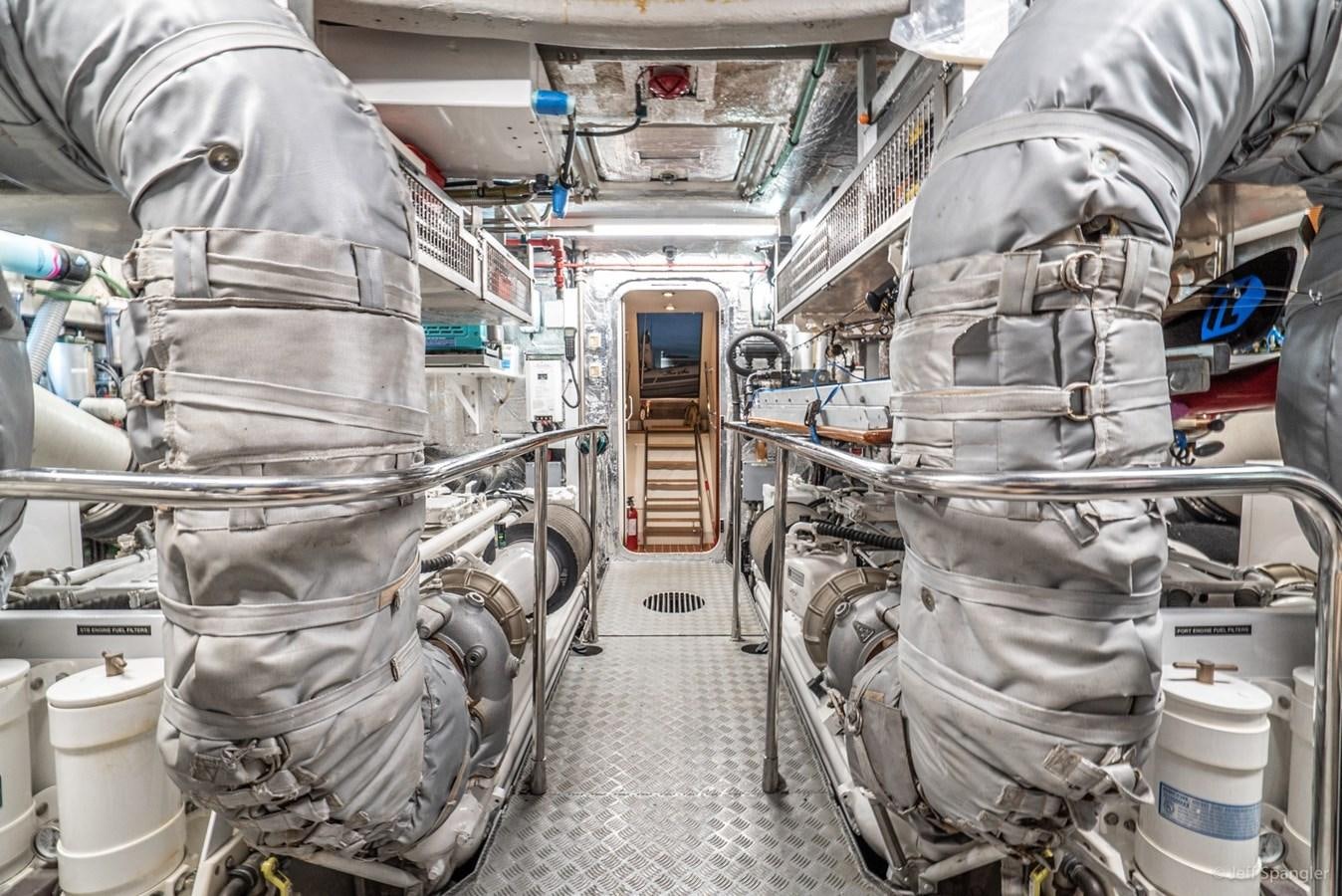 a few people in a room aboard NAKOA Yacht for Sale