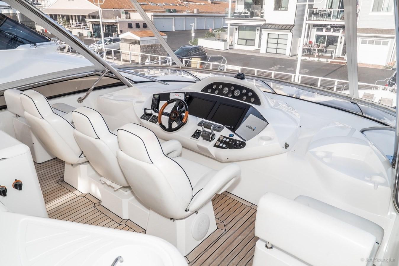 a car with a steering wheel aboard NAKOA Yacht for Sale