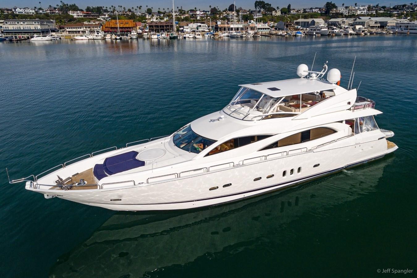 a white yacht in the water aboard NAKOA Yacht for Sale