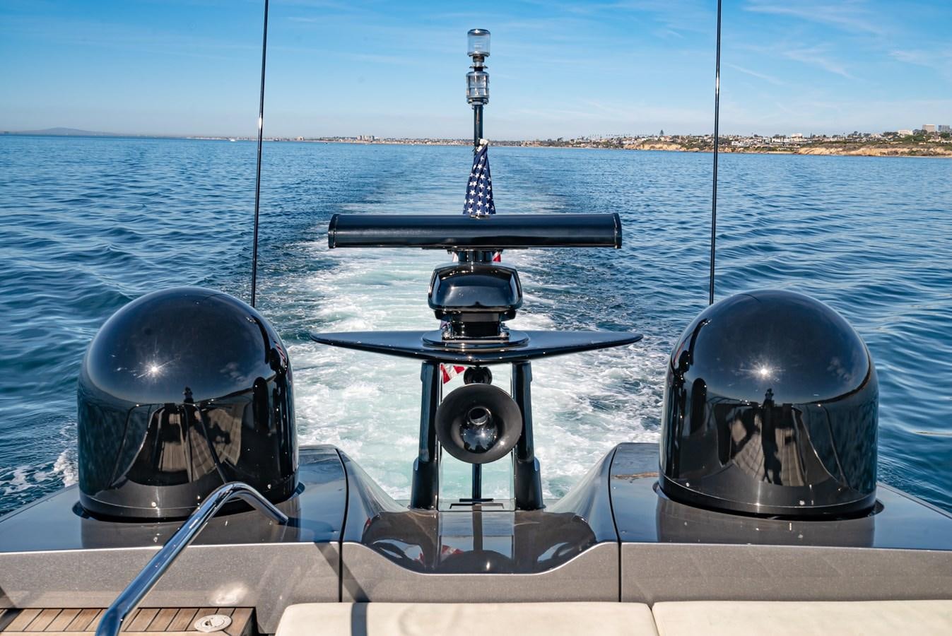 a boat with a satellite dish on it aboard MO T0WN Yacht for Sale