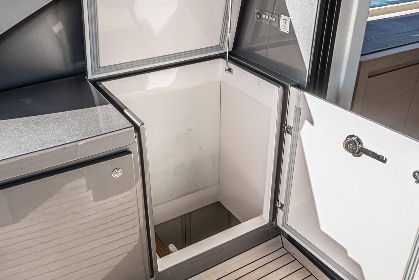 a kitchen with stainless steel appliances aboard MO T0WN Yacht for Sale