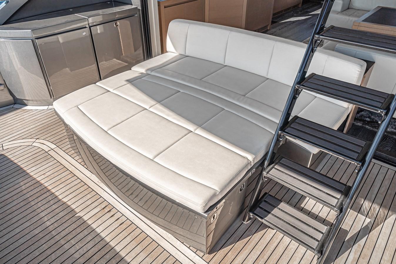 a bed in a room aboard MO T0WN Yacht for Sale