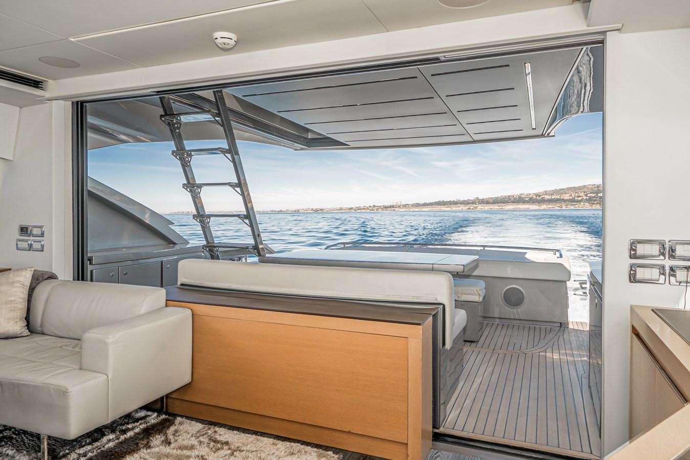 a boat with a deck aboard MO T0WN Yacht for Sale