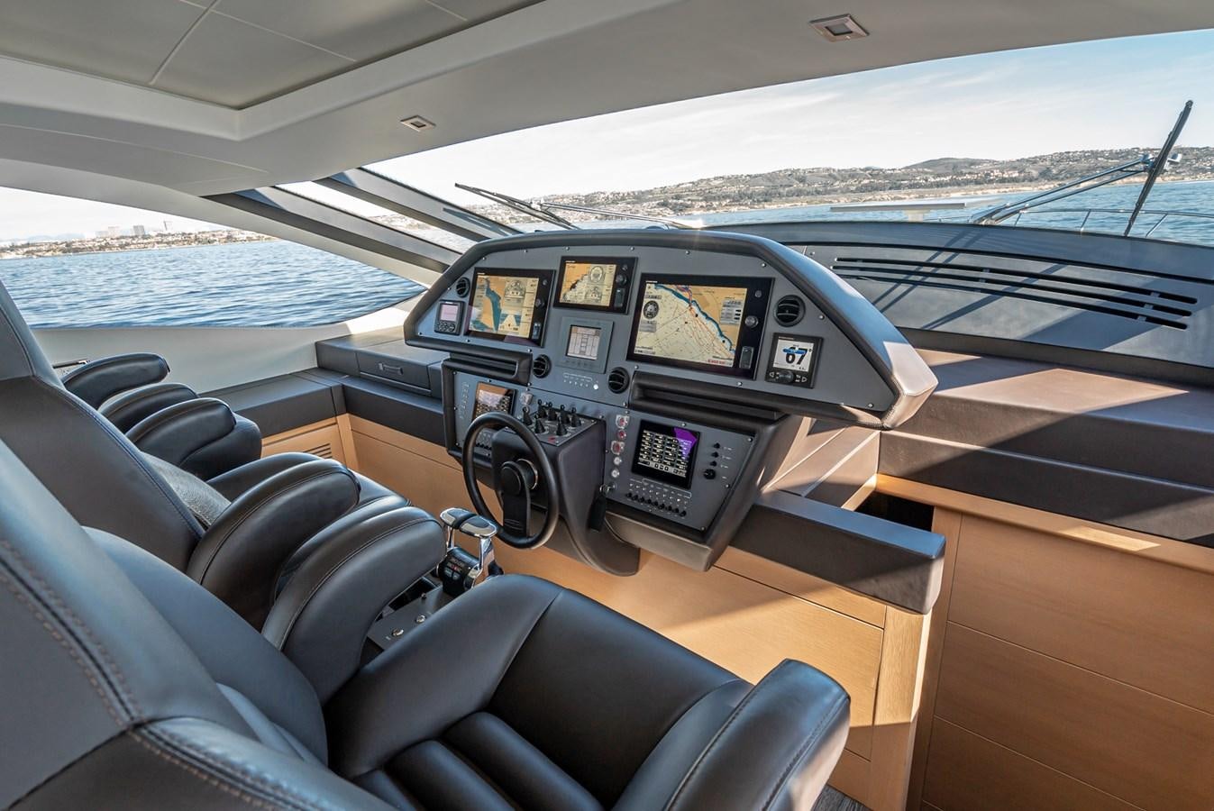 inside of a car aboard MO T0WN Yacht for Sale
