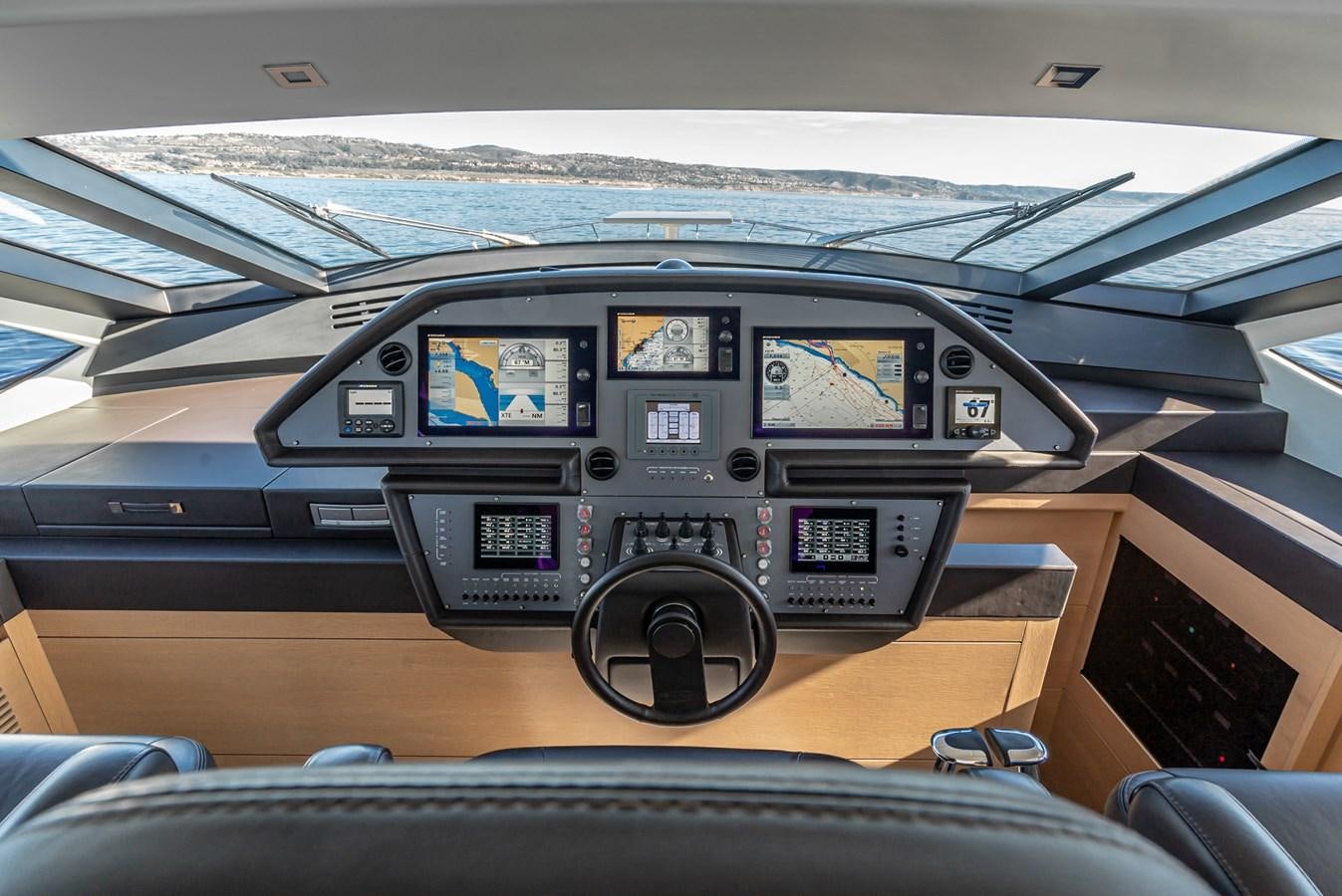 a dashboard of a car aboard MO T0WN Yacht for Sale