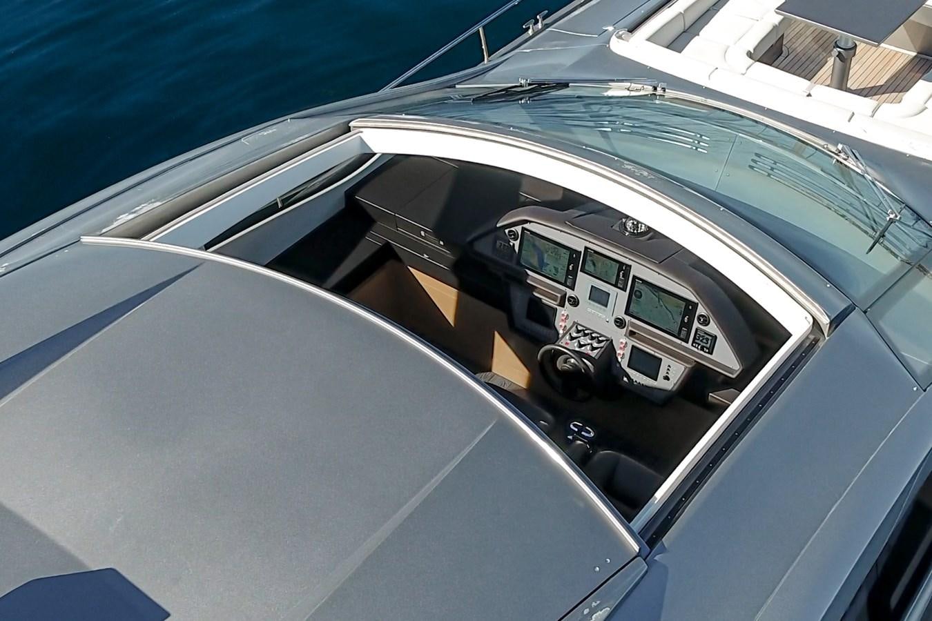 the inside of a car aboard MO T0WN Yacht for Sale