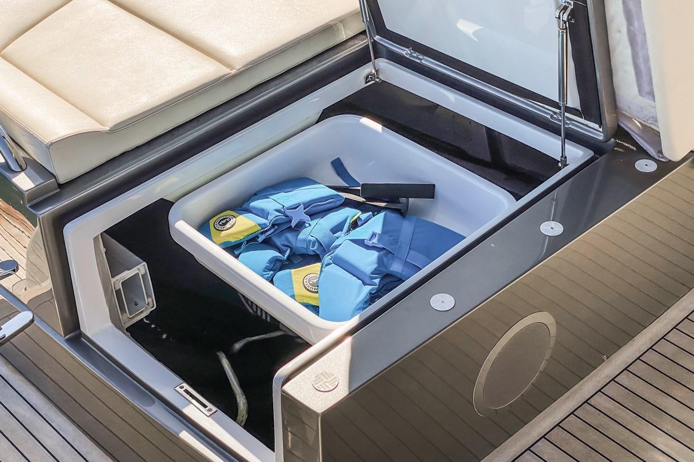 a silver box with a blue lid aboard MO T0WN Yacht for Sale