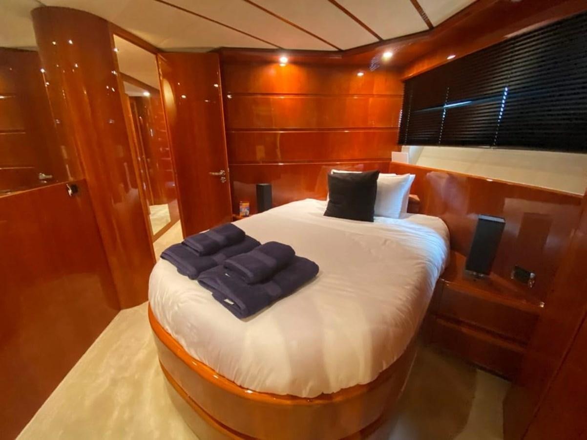 a bed in a room aboard YAIZA T Yacht for Sale