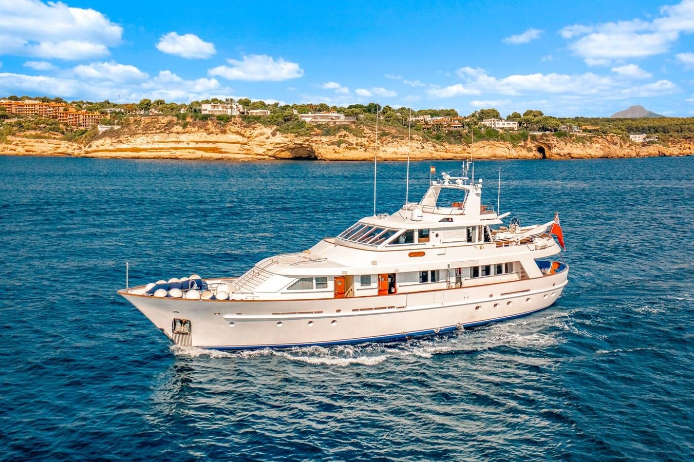 a white boat on the water aboard ALDONZA Yacht for Sale