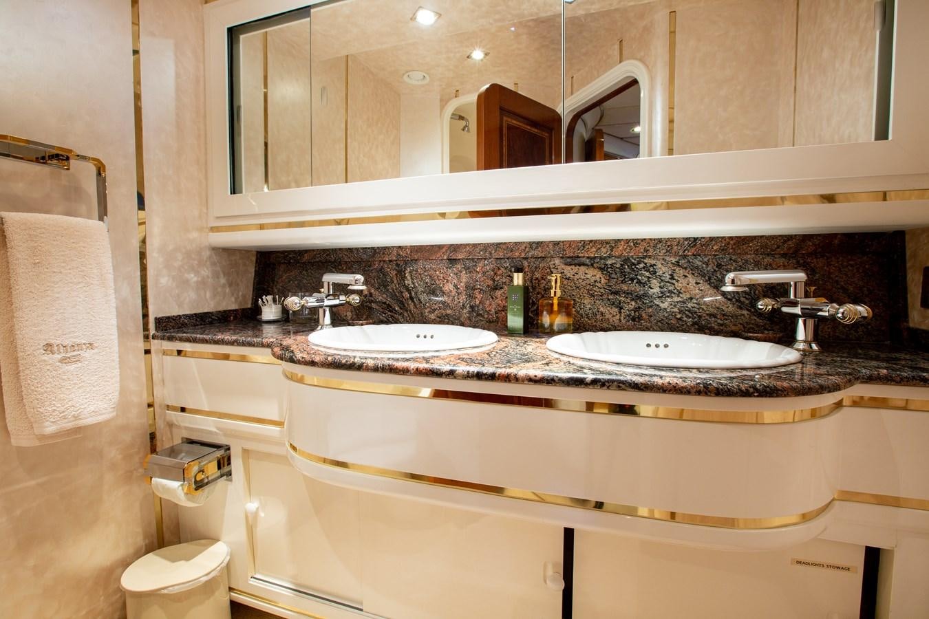a bathroom with a large mirror aboard ALDONZA Yacht for Sale