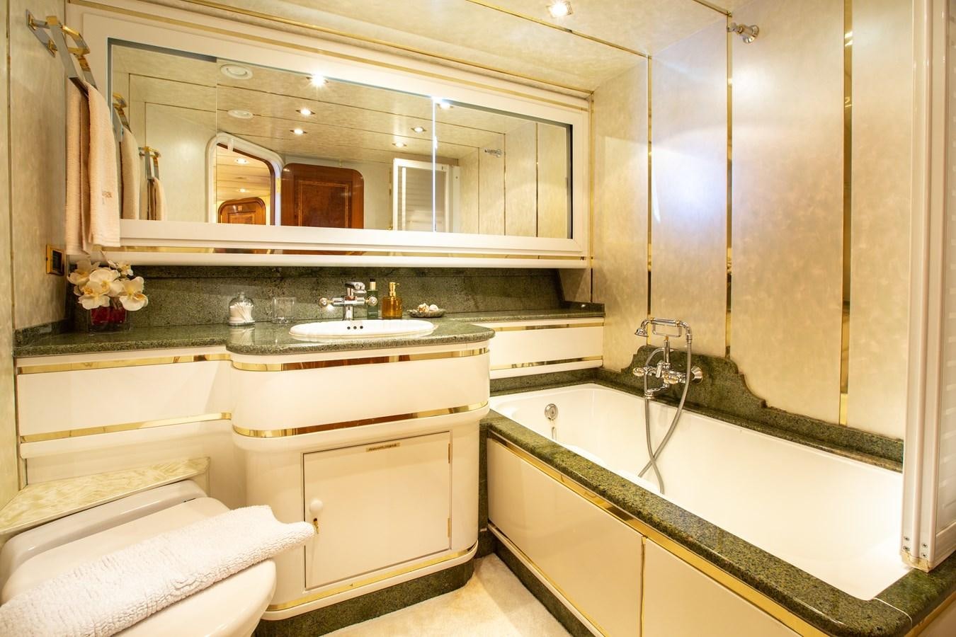 a bathroom with a sink and a mirror aboard ALDONZA Yacht for Sale