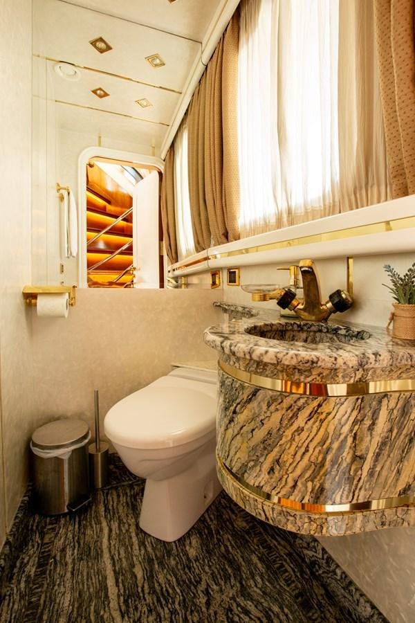 a bathroom with a toilet and sink aboard ALDONZA Yacht for Sale