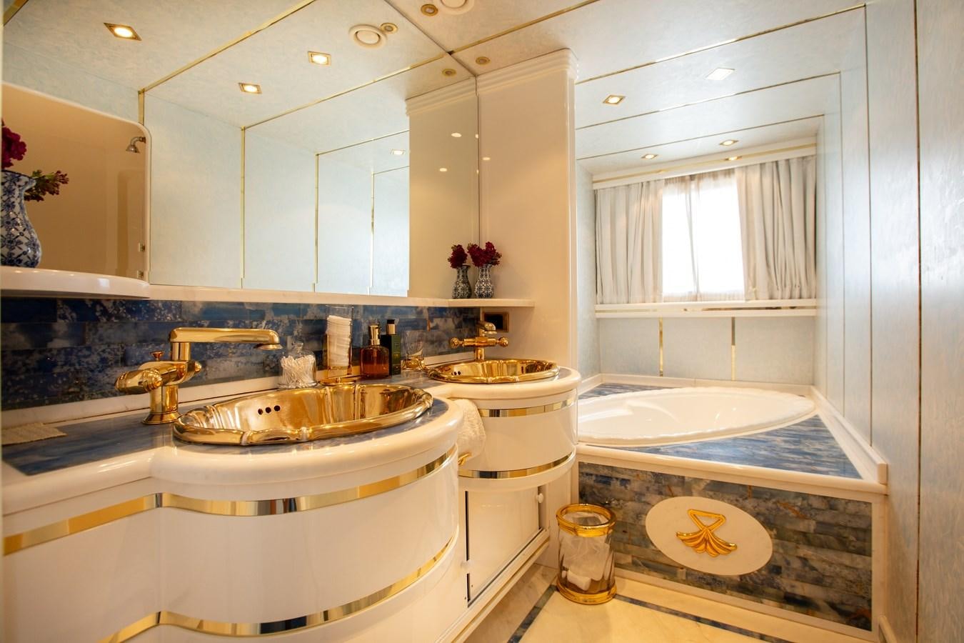 a bathroom with a sink and tub aboard ALDONZA Yacht for Sale