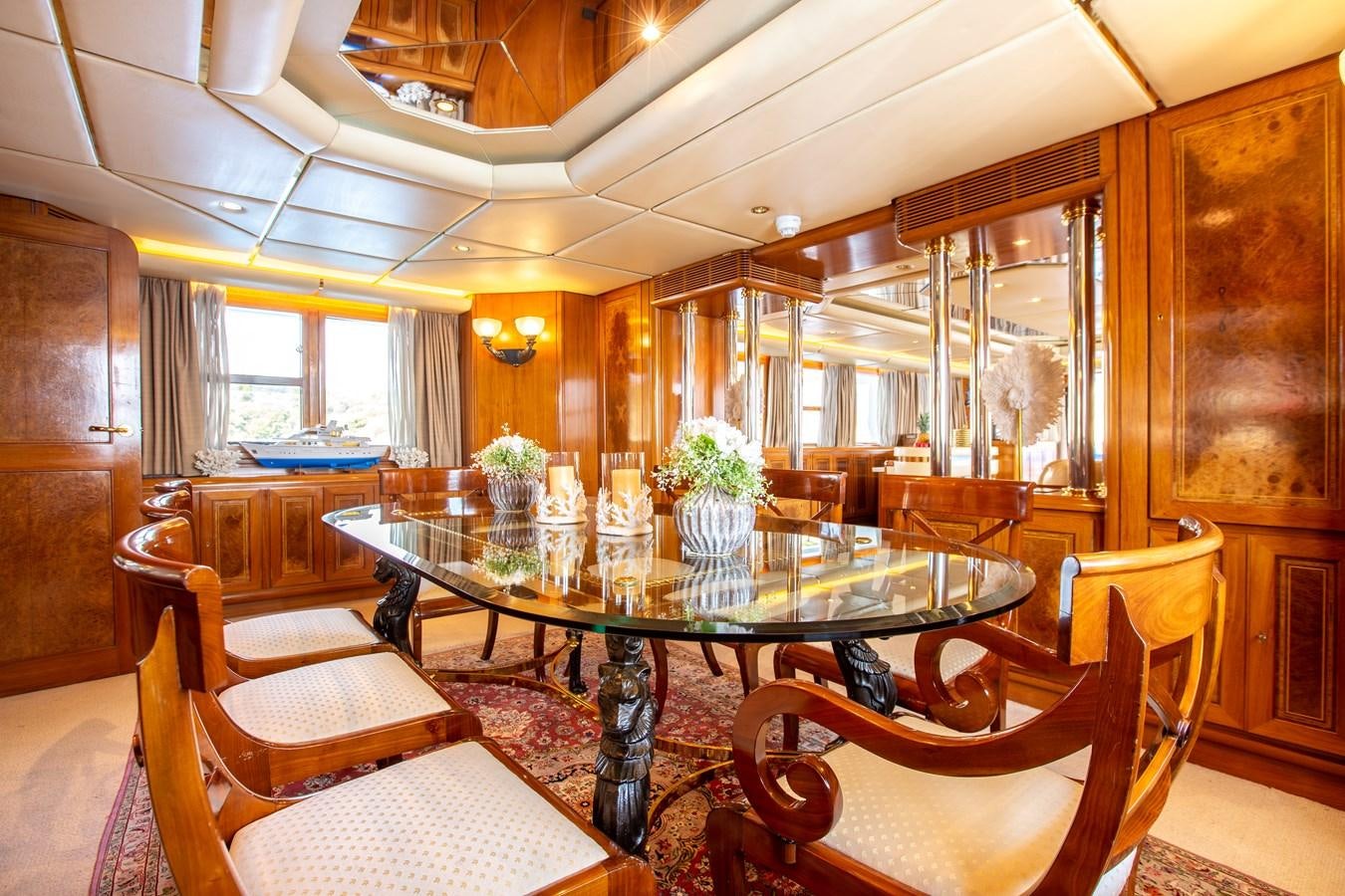 a dining room with a table aboard ALDONZA Yacht for Sale