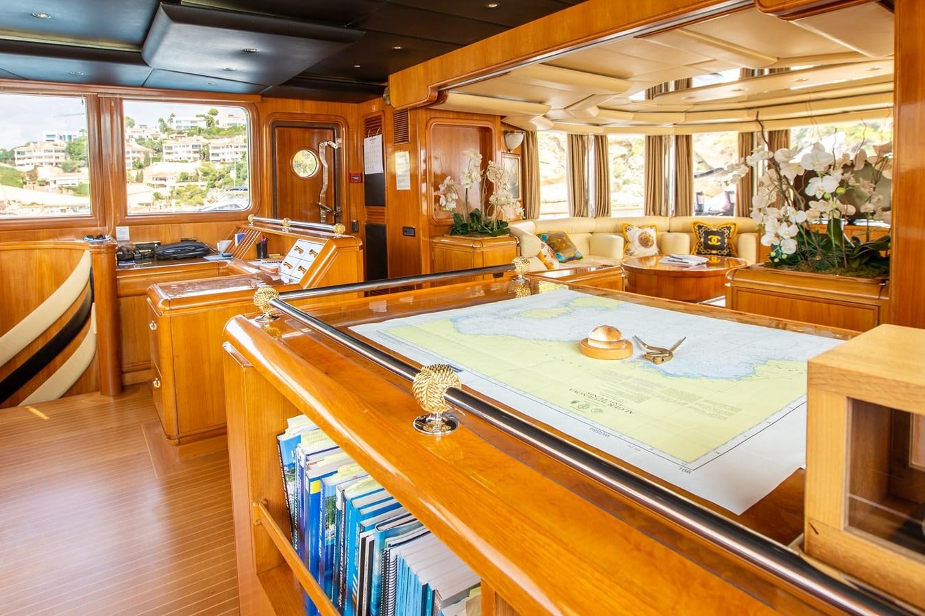 a large room with a table and chairs aboard ALDONZA Yacht for Sale
