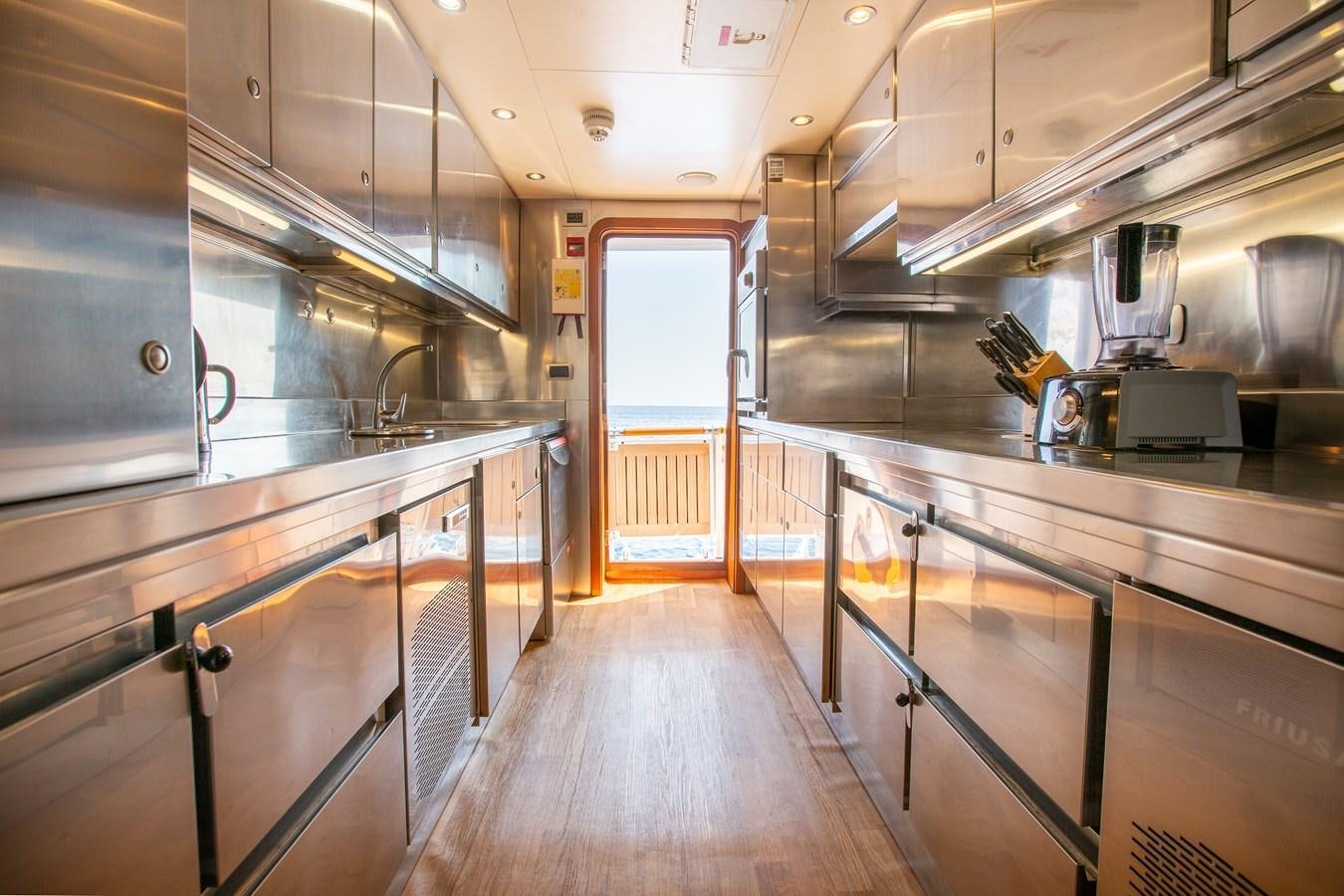 a kitchen with stainless steel appliances aboard ALDONZA Yacht for Sale