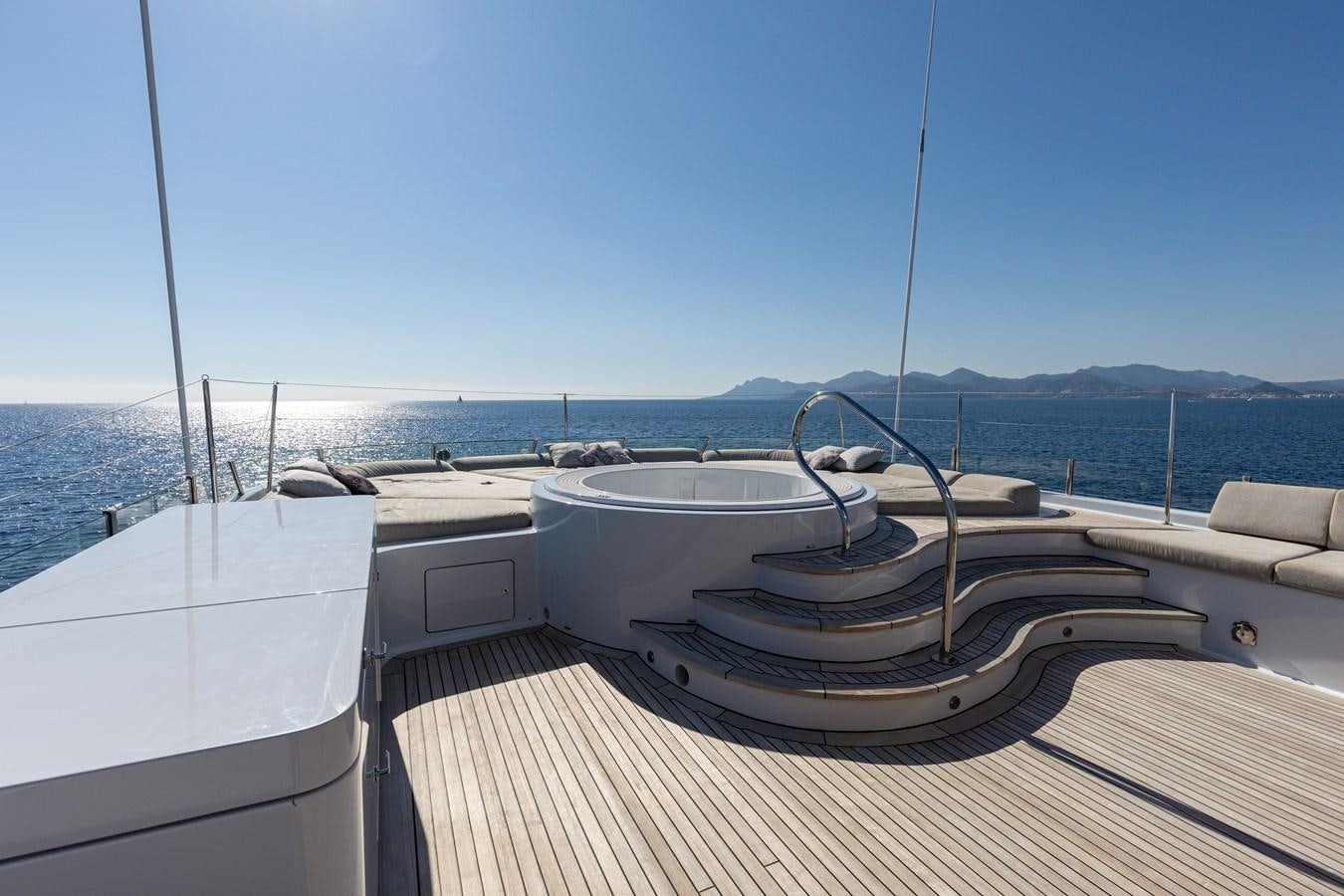 a boat on a deck aboard WERE DREAMS Yacht for Sale