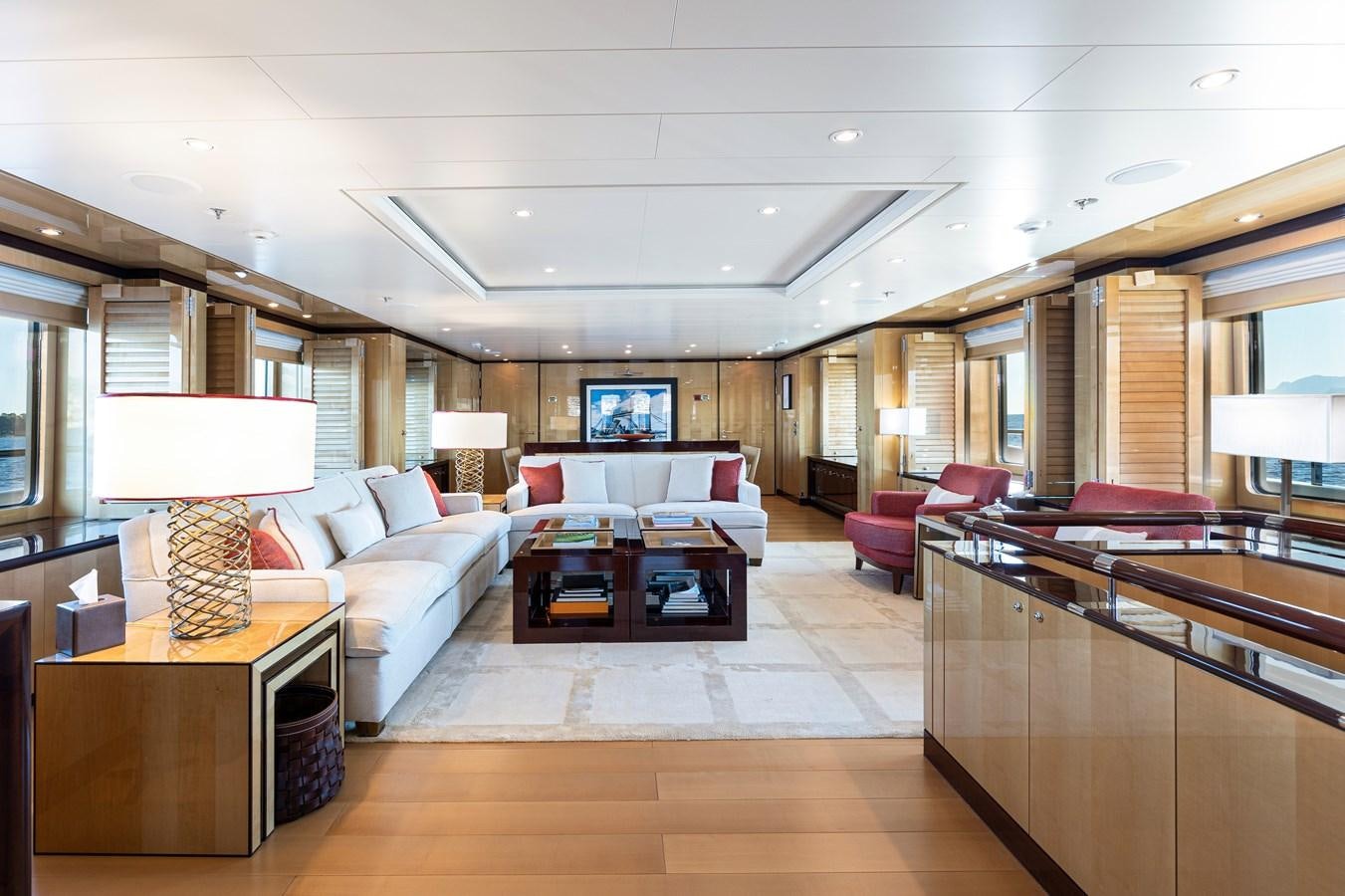 a living room with a large window aboard WERE DREAMS Yacht for Sale