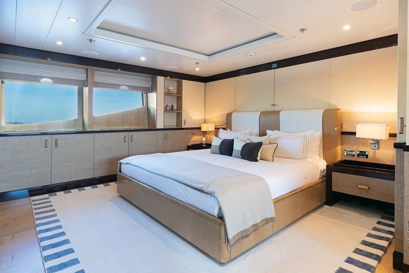 a large bedroom with a large bed aboard WERE DREAMS Yacht for Sale