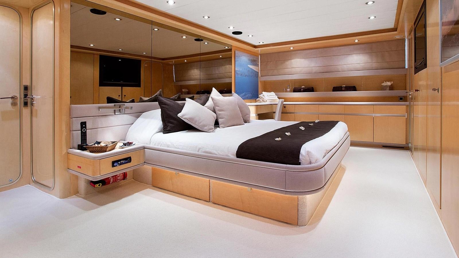 a bed in a room aboard SUNLINER X Yacht for Sale