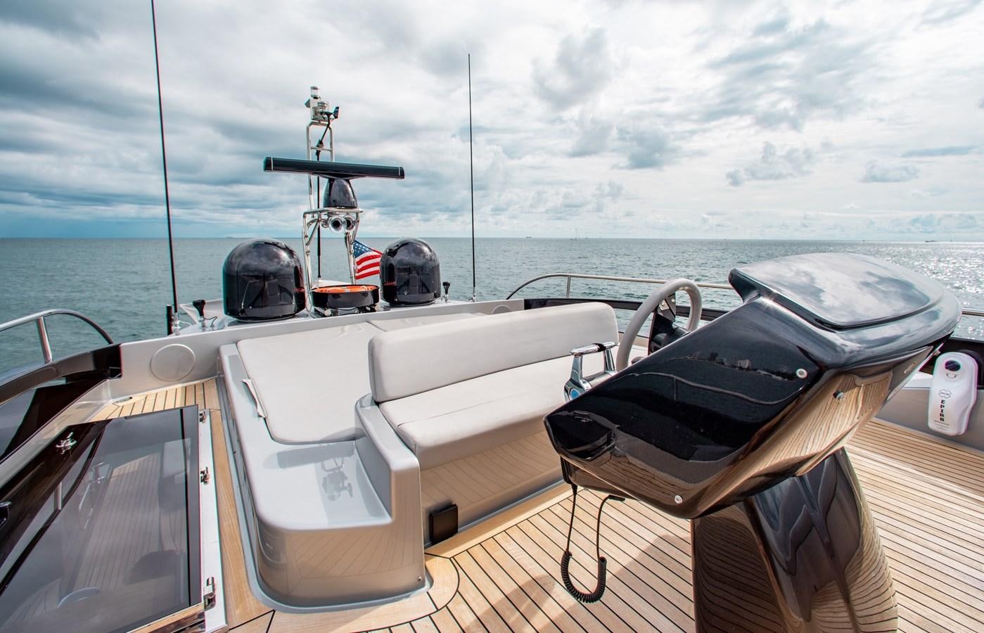 a boat with a large black object on the front aboard MOVIN DAY Yacht for Sale