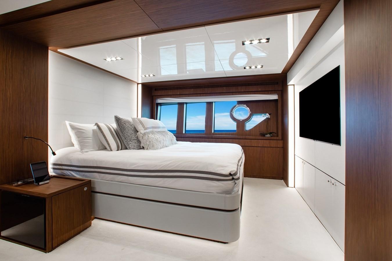 a room with a bed and a desk aboard MOVIN DAY Yacht for Sale
