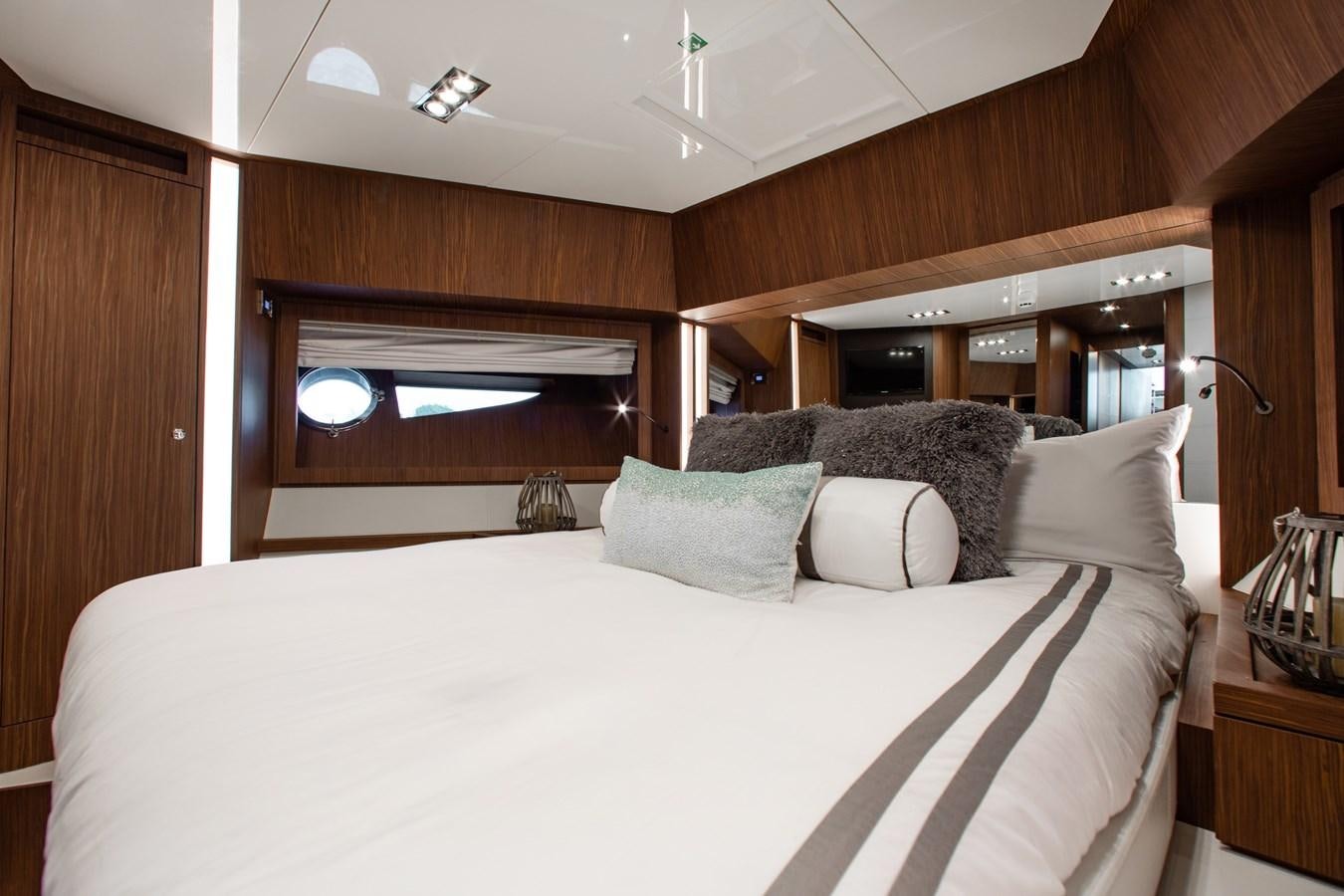 a bed with pillows aboard MOVIN DAY Yacht for Sale