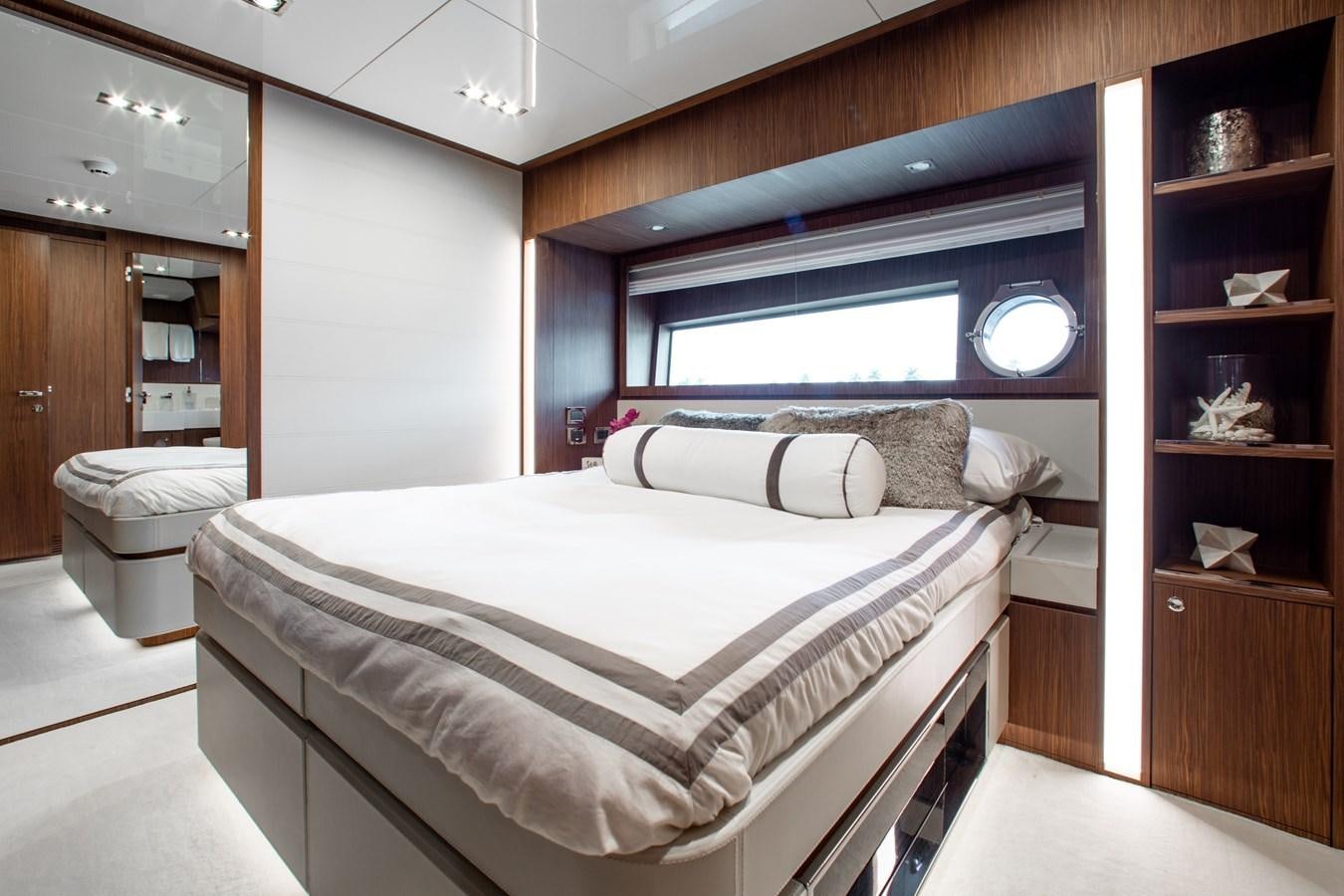 a bed in a room aboard MOVIN DAY Yacht for Sale