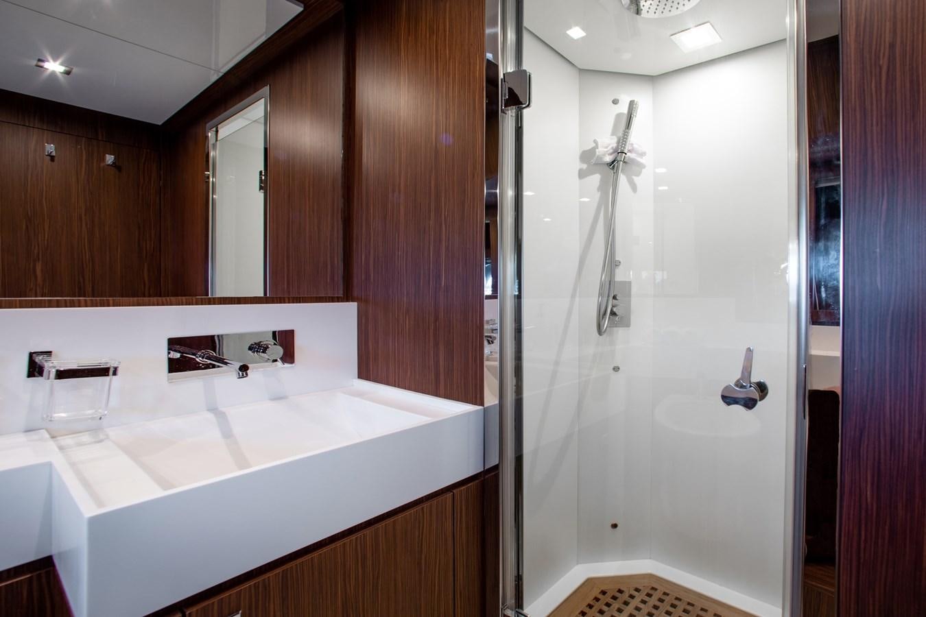 a bathroom with a shower and sink aboard MOVIN DAY Yacht for Sale