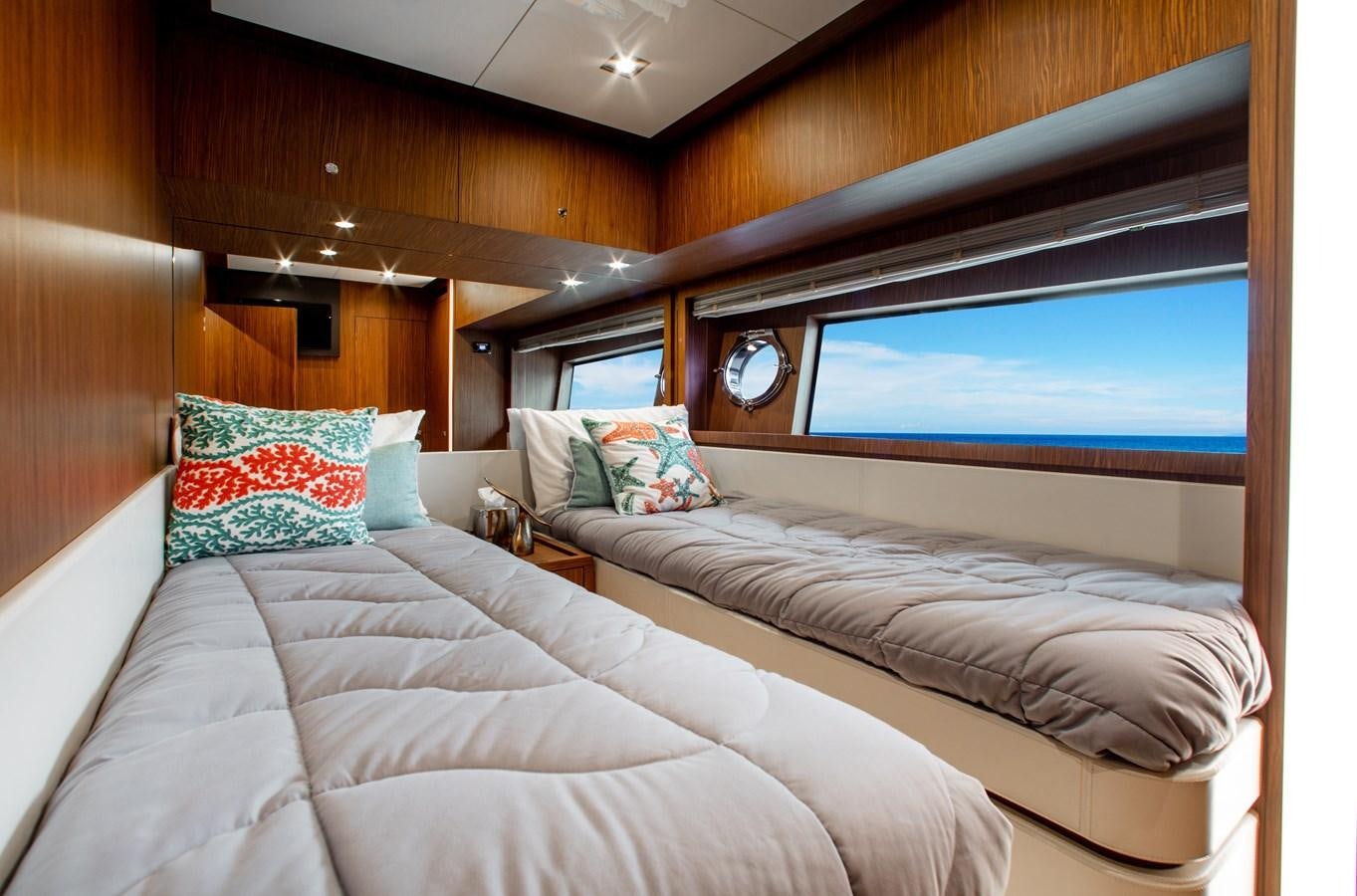a room with two beds aboard MOVIN DAY Yacht for Sale