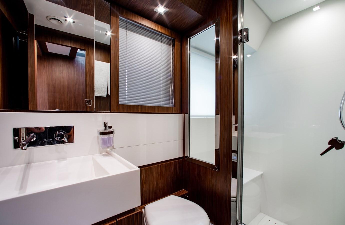 a bathroom with a sink and a toilet aboard MOVIN DAY Yacht for Sale