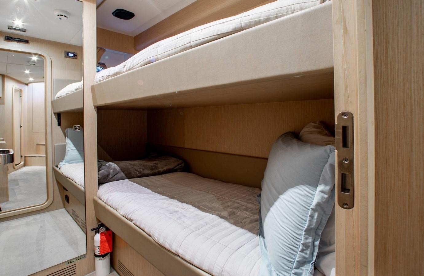 a room with two beds aboard MOVIN DAY Yacht for Sale