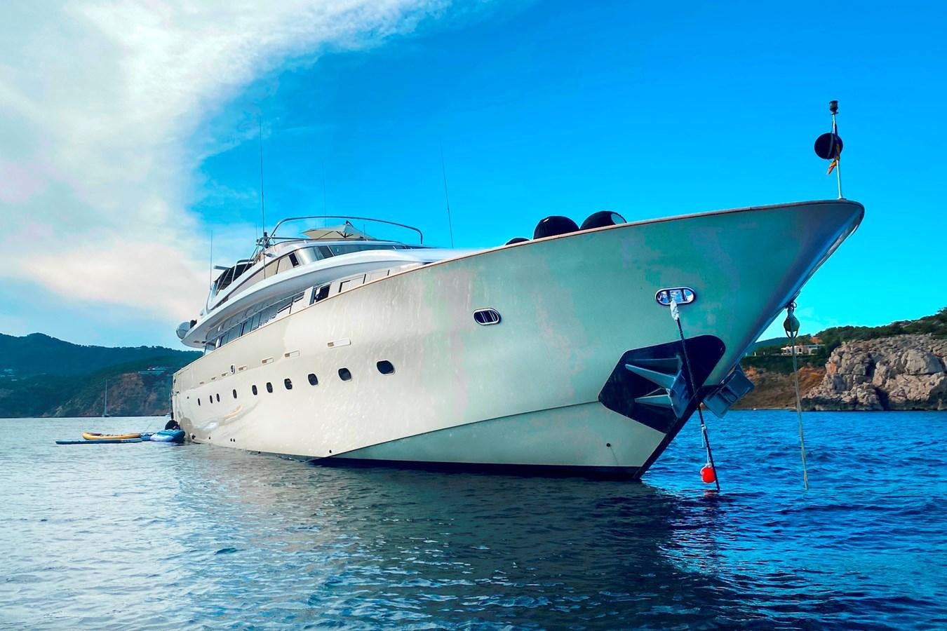 a white boat in the water aboard PAULA III Yacht for Sale