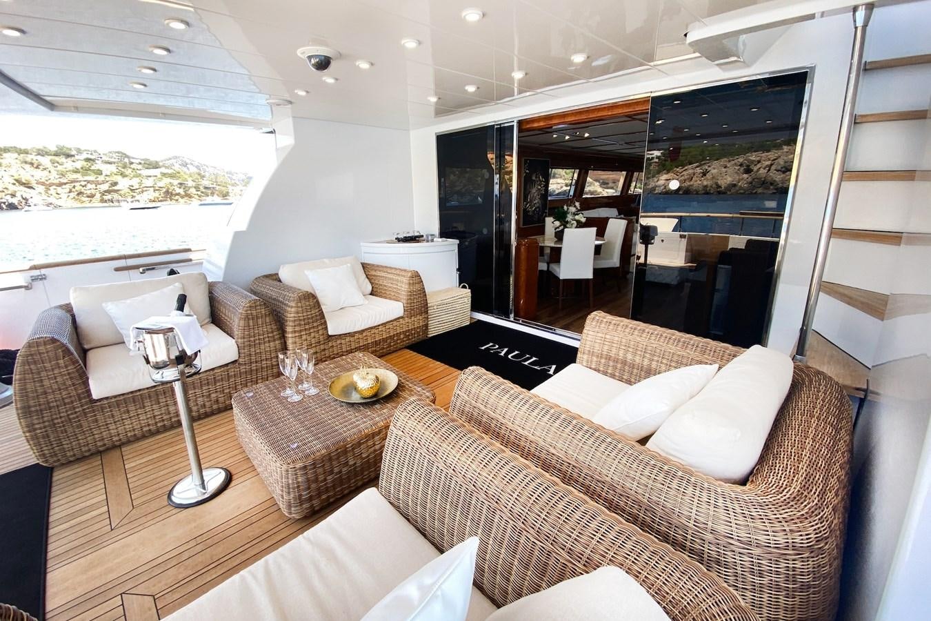 a living room with a large window aboard PAULA III Yacht for Sale