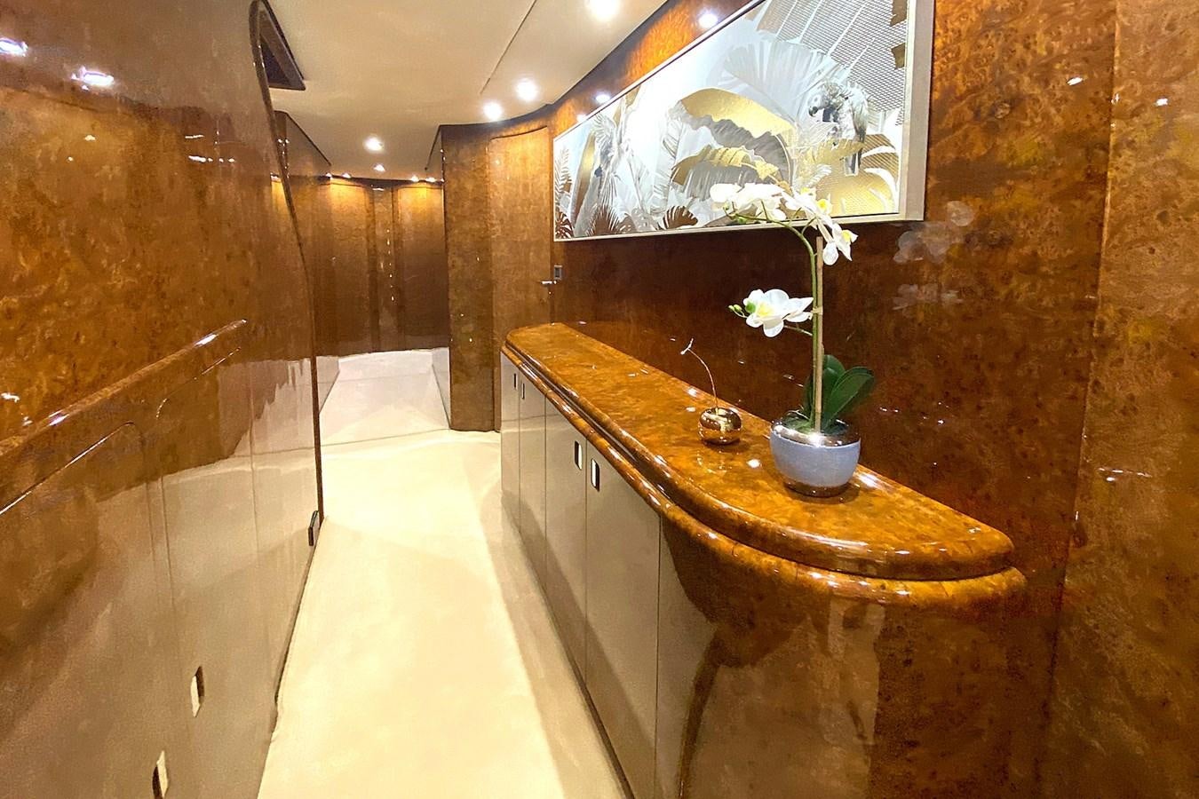 a bathroom with a countertop sink and a mirror aboard PAULA III Yacht for Sale