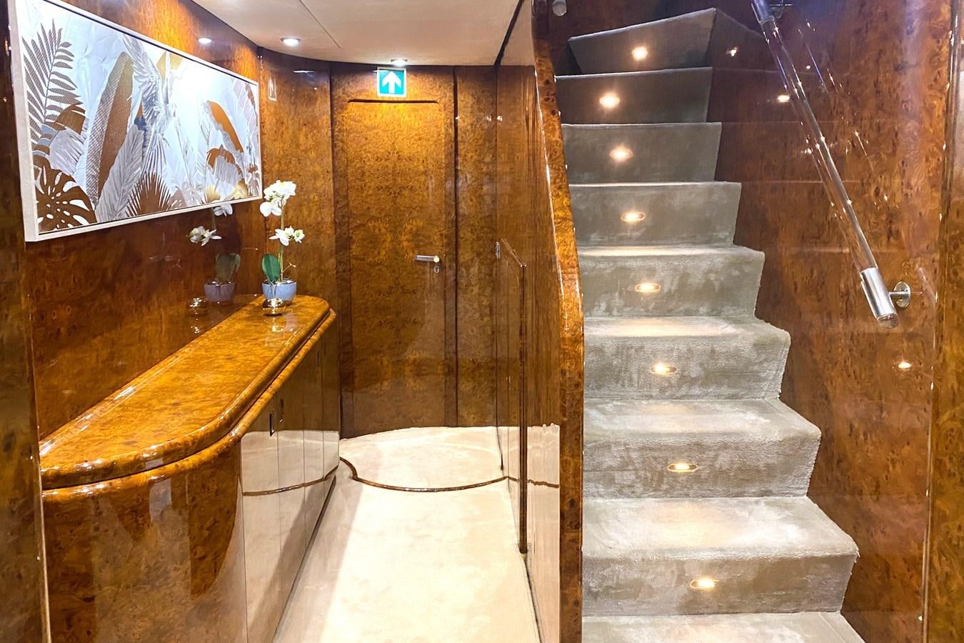 a set of stairs in a room aboard PAULA III Yacht for Sale