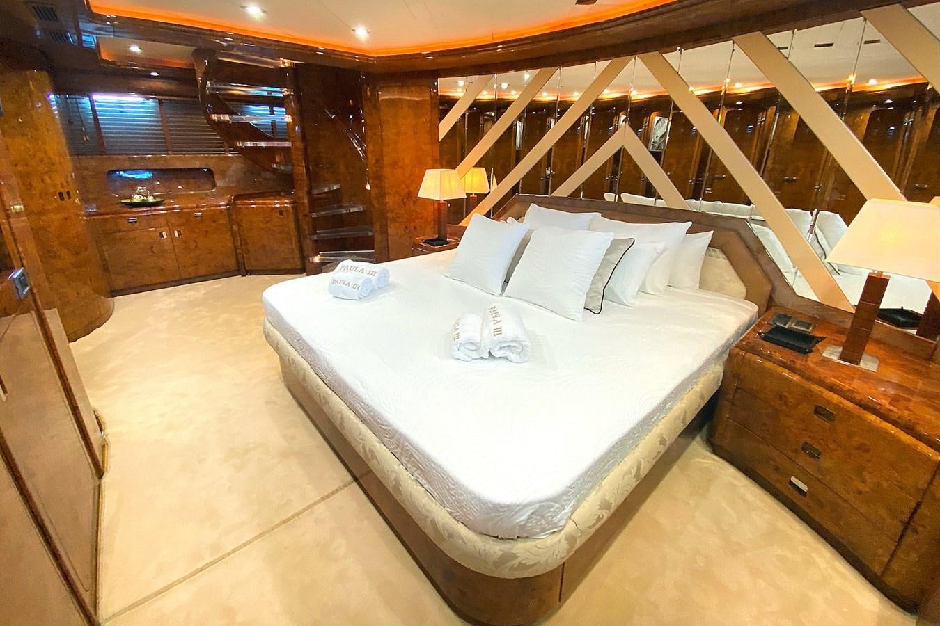 a bed in a room aboard PAULA III Yacht for Sale