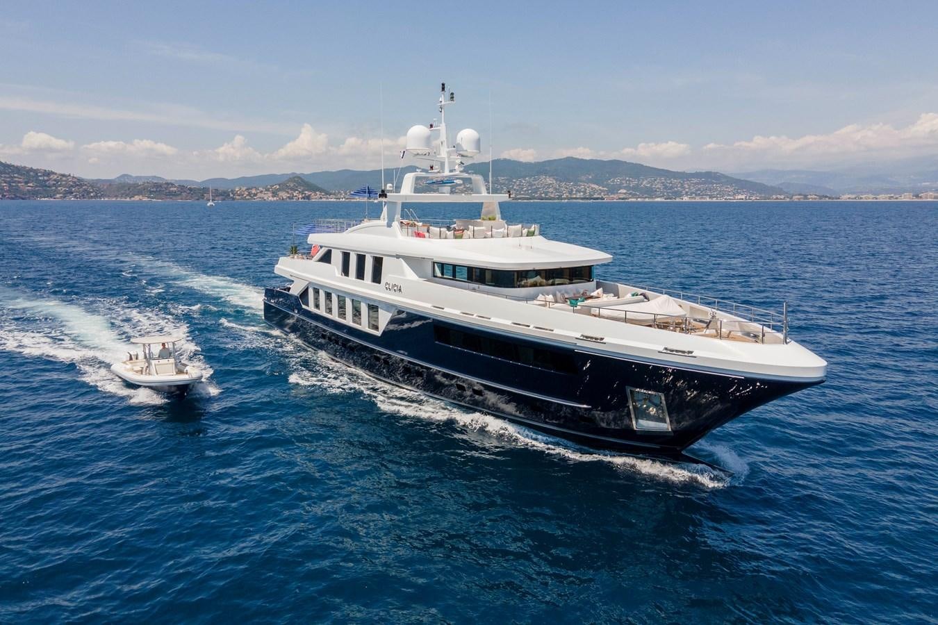 a large boat sailing on the water aboard TIMBUKTU Yacht for Charter
