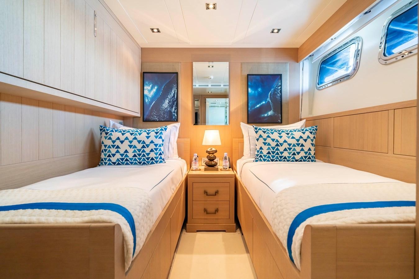 a room with two beds aboard TIMBUKTU Yacht for Charter
