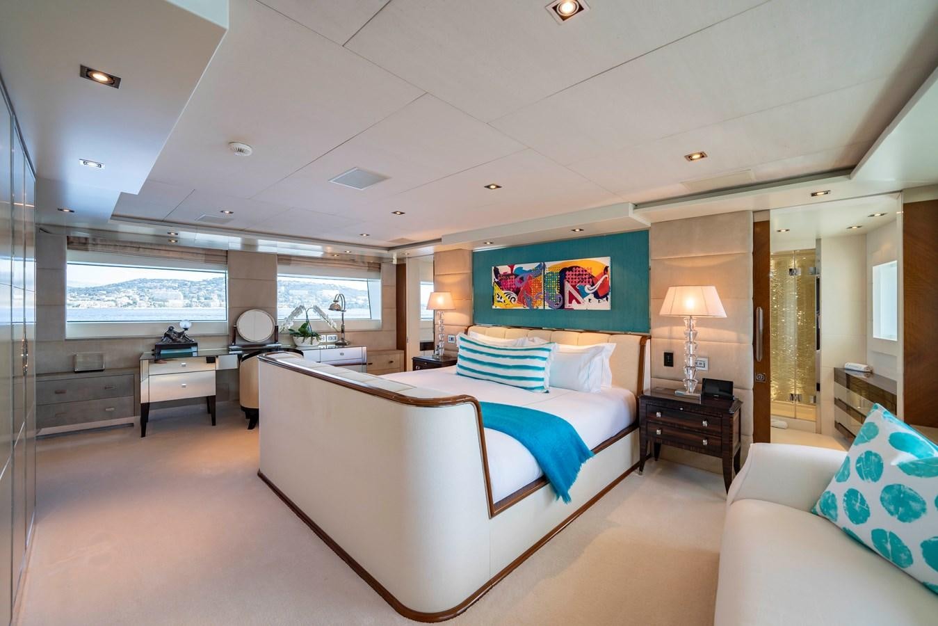a large bedroom with a large bed aboard TIMBUKTU Yacht for Charter