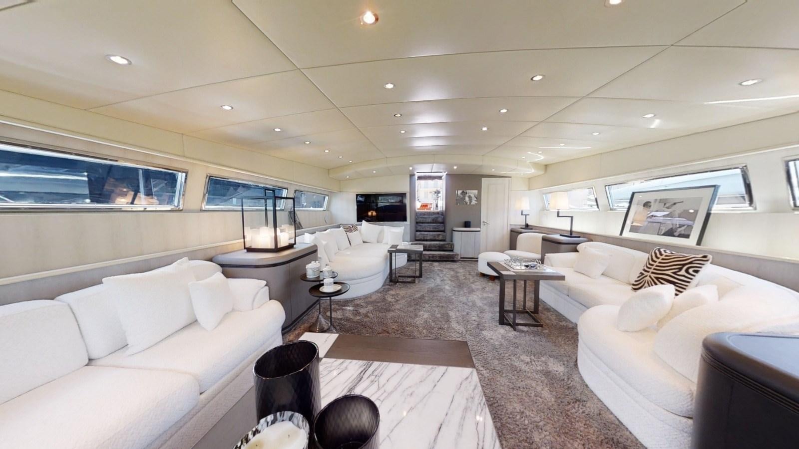 a living room with a large window aboard LAUREN V Yacht for Sale