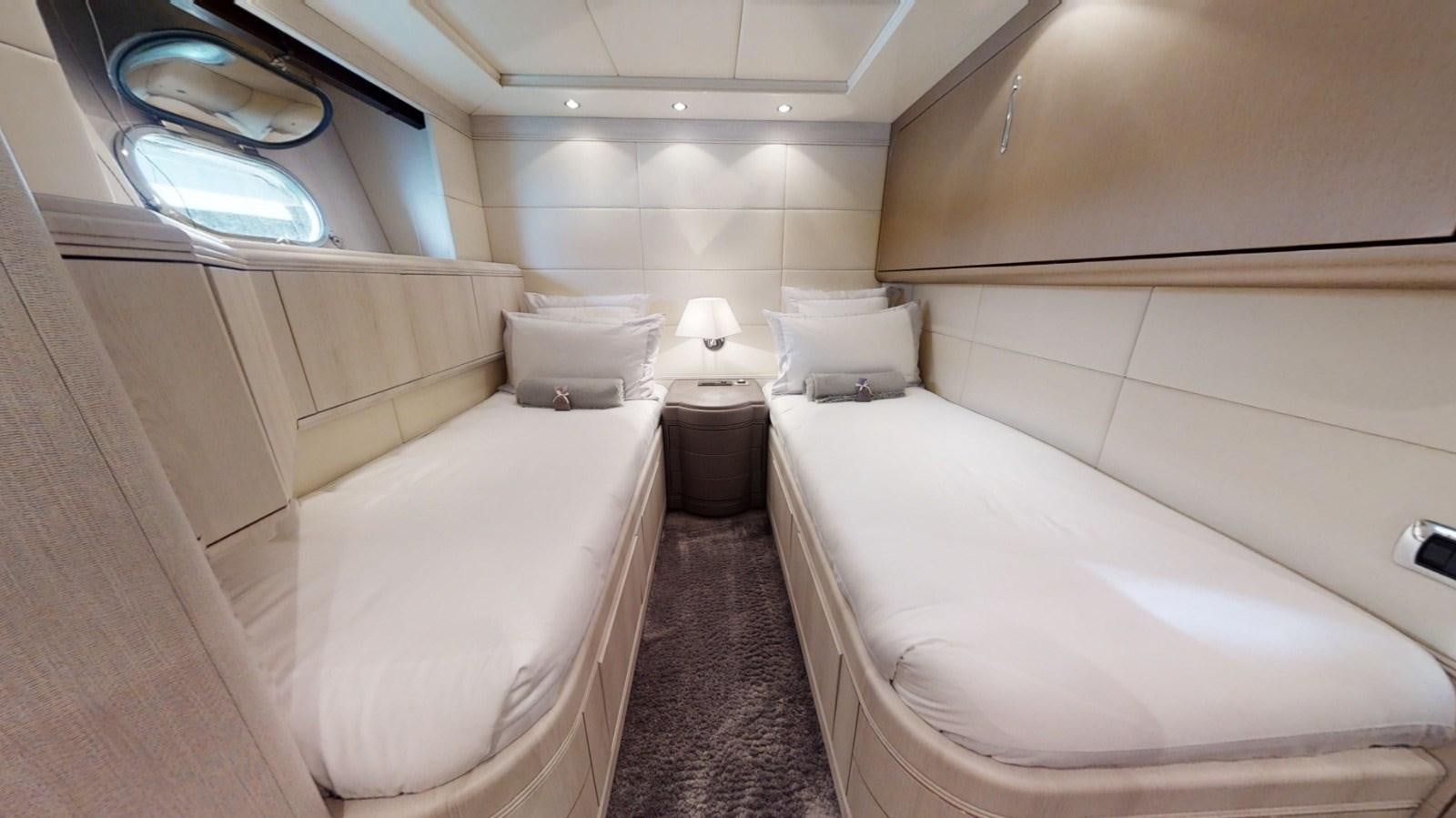 a bathroom with a tub and a toilet aboard LAUREN V Yacht for Sale